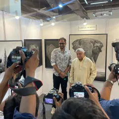 Posing for the press with Javed Akhtar saab in front of my elephant artwork. It was a memorable day with significant media attention.