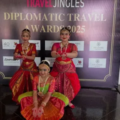 My students in their beautiful red and gold costumes, ready for their performance. This picture captures their excitement and readiness before stepping onto the stage.