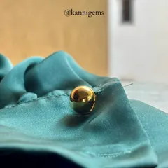 A true gentleman knows that details matter. These simple, polished gold ball cufflinks are more than an accessory, they are an extension of your style.