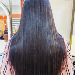 The "after" shot of the Hair Botox treatment. The result is smooth, sleek, and healthy-looking hair with a beautiful shine.