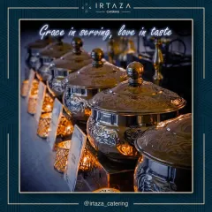 A close-up of my ornate silver-finished serving bowls, lined up and ready for a grand feast. The warm glow from the candle votives reflects beautifully off the polished metal, adding a touch of grace to the buffet line.