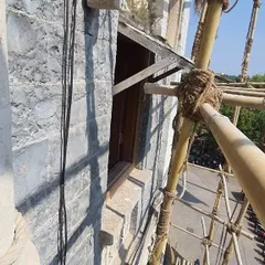 Our team carefully ran wiring along the structure, ensuring it was hidden from view to not disrupt the building's historical aesthetic. Every detail of the installation was planned to be as non-invasive as possible.