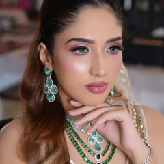 A poised and elegant shot, highlighting the soft definition of the eyes and lips.