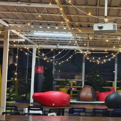 We made sure the entire recreational area at the Bizom office was part of the festive fun. This view shows the lighting above the casual seating area with bean bags and a projector, making it a perfect spot for an office holiday movie screening.