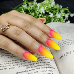 A vibrant and eye-catching neon ombré. This set features a stunning gradient from hot pink to bright yellow, creating a fiery sunset effect that is perfect for summer.