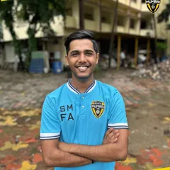 A portrait of one of our smiling coaches. Our staff brings positive energy and professional expertise to every single training session.