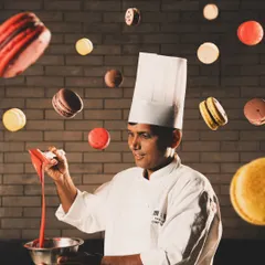 A creative portrait of a pastry chef surrounded by floating macarons. We love collaborating with talented individuals and capturing their personality and craft.