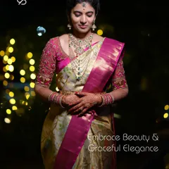 Exquisite allure in a bespoke creation. My client stuns in her custom designer blouse and Kanchipuram saree, epitomizing sheer beauty and grace on her memorable engagement day.
