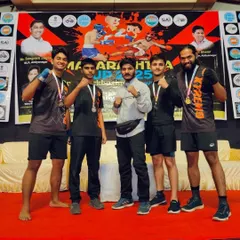 The team celebrating their wins. We are a family that supports each other through the grind of training and the pressure of competition.