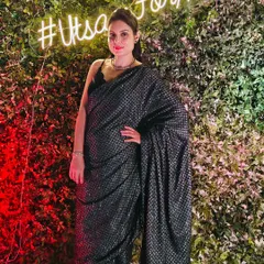 Setting a chic and glamorous tone for a cocktail night. I believe the host's attire is key to complementing the event's vibe, and for this evening, a sparkling saree was the perfect fit.