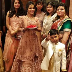 I love getting the whole family ready. This photo shows a group of happy clients at a wedding, where I created coordinated but individual makeup looks for the bride and her family members.