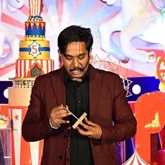 A circus themed birthday party is the perfect place for magic. Here I am performing a close-up trick on stage, making the birthday celebration extra special.