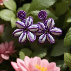 A beautiful shot of the Bhavana Pandey-inspired floral earrings. The combination of purple and white beads creates a striking look, perfect for festive occasions or a stylish brunch.