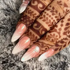 Another look at the bridal airbrush ombre nails, showing how they beautifully complement the bride's traditional henna design.