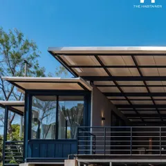This is one of the three container units we delivered for a project in South Coorg. The design features an elevated structure and a large covered deck to take full advantage of the beautiful forest views.