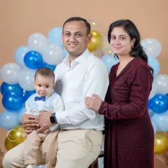 A formal family portrait from a first birthday session. Even during a fun celebration, we take time to capture a more classic portrait that you can hang on your wall for years to come.
