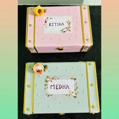 Will you be my bridesmaid? Ask your crew with these beautiful, personalized proposal trunks. We designed these matching pink and mint green boxes with custom name tags for a bride's special ladies.