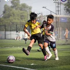 The determination is clear on their faces. This action shot from our Mumbai league shows the focus and drive of our young athletes.