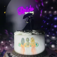 For this bridal shower, the decor included a fun "Bride to be" neon sign and a highly personalized cake. These details help create a festive atmosphere that is all about celebrating the bride.