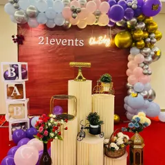 Another view of the purple and silver 'Oh Baby' shower decor.