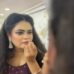 This over-the-shoulder view shows the process of defining the lips. In my classes, students get to practice these techniques on models to build their practical skills and confidence.