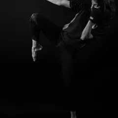 A demonstration of a powerful high kick, showcasing the flexibility and technique we develop in our kickboxing program.