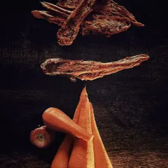 Our Carrot & Chicken Jerky is a fantastic source of vitamins. We pair real, fresh carrots with our savory chicken to create a crunchy, nutrient-rich snack that supports your dog's overall health.