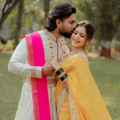 A tender moment from a traditional Marathi pre-wedding shoot. We focus on capturing the quiet connection between a couple, highlighting the richness of their heritage attire, like the groom's classic sherwani and the bride's vibrant yellow nauvari saree.