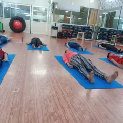 A quiet moment of Savasana at the end of a session. This final resting pose is non-negotiable in our classes as it helps reduce fatigue and calm the entire system.