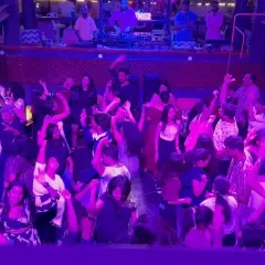An overhead view of the packed dance floor during my set. This is the result I deliver: a room full of people dancing and having the time of their lives.