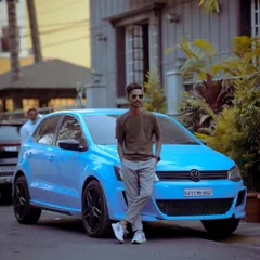 A men's fashion portrait featuring a stylish car, creating a modern and aspirational urban look. I often incorporate elements like this to build a specific narrative for a shoot.