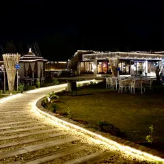 The pathway to our cafe, lit up at night. I wanted to create a grand and welcoming entrance for all my guests.