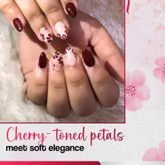 Cherry-toned petals meet soft elegance in this design. I paired a deep maroon gel polish with accent nails featuring delicate, hand-painted floral patterns for a polished and classy finish.