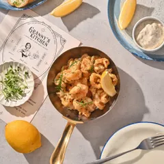 Another look at my crispy calamari, served in a brass pan. Procured fresh and cooked to perfection.