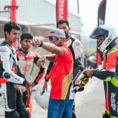 A pre-session briefing with our chief instructor, Anish Shetty. We believe in a structured approach, combining theory with practical application to ensure every rider understands the 'why' behind each technique before hitting the track.