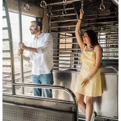 The Mumbai local train is more than just transport; it's a part of the city's soul. We captured some beautifully candid moments of the couple enjoying the journey, just as they do in their everyday lives.