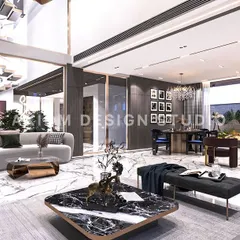 An overhead view of the massive double-height drawing room. The open layout connects multiple seating areas, the dining space, and the upper floor, creating a cohesive and interactive environment filled with natural light.