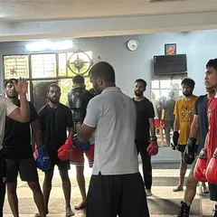 Another shot of the group receiving instructions. Everyone is attentive and ready to put in the work.