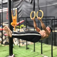This is what I call the beauty of strength. With calisthenics, you'll build a lean, athletic physique and develop incredible control over your own body, learning moves like this L-sit on the rings.