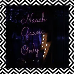 We set the mood for the sangeet with fun and quirky neon signs like this one. It's all about creating a high-energy atmosphere where the only rule is "Naach Gaana Only".