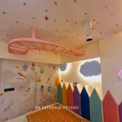 Another angle of the kids' room, showing the space-themed wallpaper that includes a height chart, making the room both fun and practical.