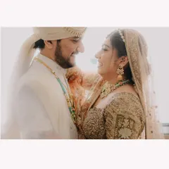 A bright, high-key photograph that gives the couple's portrait a dreamy and ethereal quality.