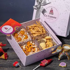 Our Diwali Wholesome Hamper features a delicious Gulab Jamun cake tub. It's a modern take on a classic dessert, with soft cake and chunks of gulab jamun in a creamy base.
