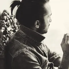 A thoughtful, candid moment captured in black and white. This is me in a quieter, more reflective mood.