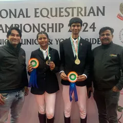 Two of our champion riders showcasing their medals from the JNEC 2024. Their success in show jumping is a testament to their skill and our training program.