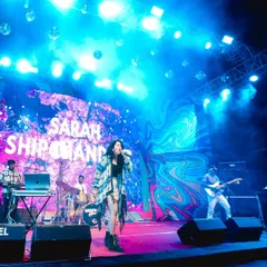 Lost in the music under the stage lights at the Popupland festival. We use professional lighting and effects to create a full concert experience.