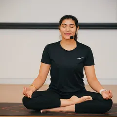 Finding calm in the chaos is essential for corporate life. I guide teams through mindfulness and meditation practices, like this seated session, to help reduce stress and improve mental clarity right at their desks.
