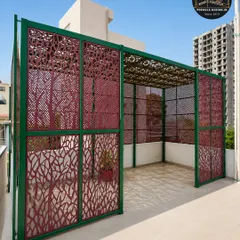 A bold and artistic statement for a rooftop terrace. This pergola features custom-colored, laser-cut metal panels with a striking tree branch motif, providing both privacy and a unique, nature-inspired aesthetic.