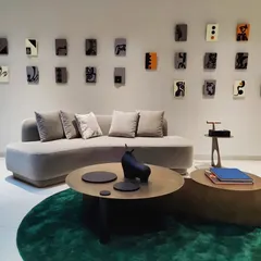 This installation for a residence in Hyderabad features a collection of small, individual 3D panels. Each panel is a miniature abstract artwork, and together they form a larger, cohesive composition that adds texture and personality to the living space.