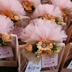 This image shows a large batch of the Women's Day hampers ready for delivery. I can manage bulk orders efficiently, ensuring every gift is consistent and ready for your office-wide event.